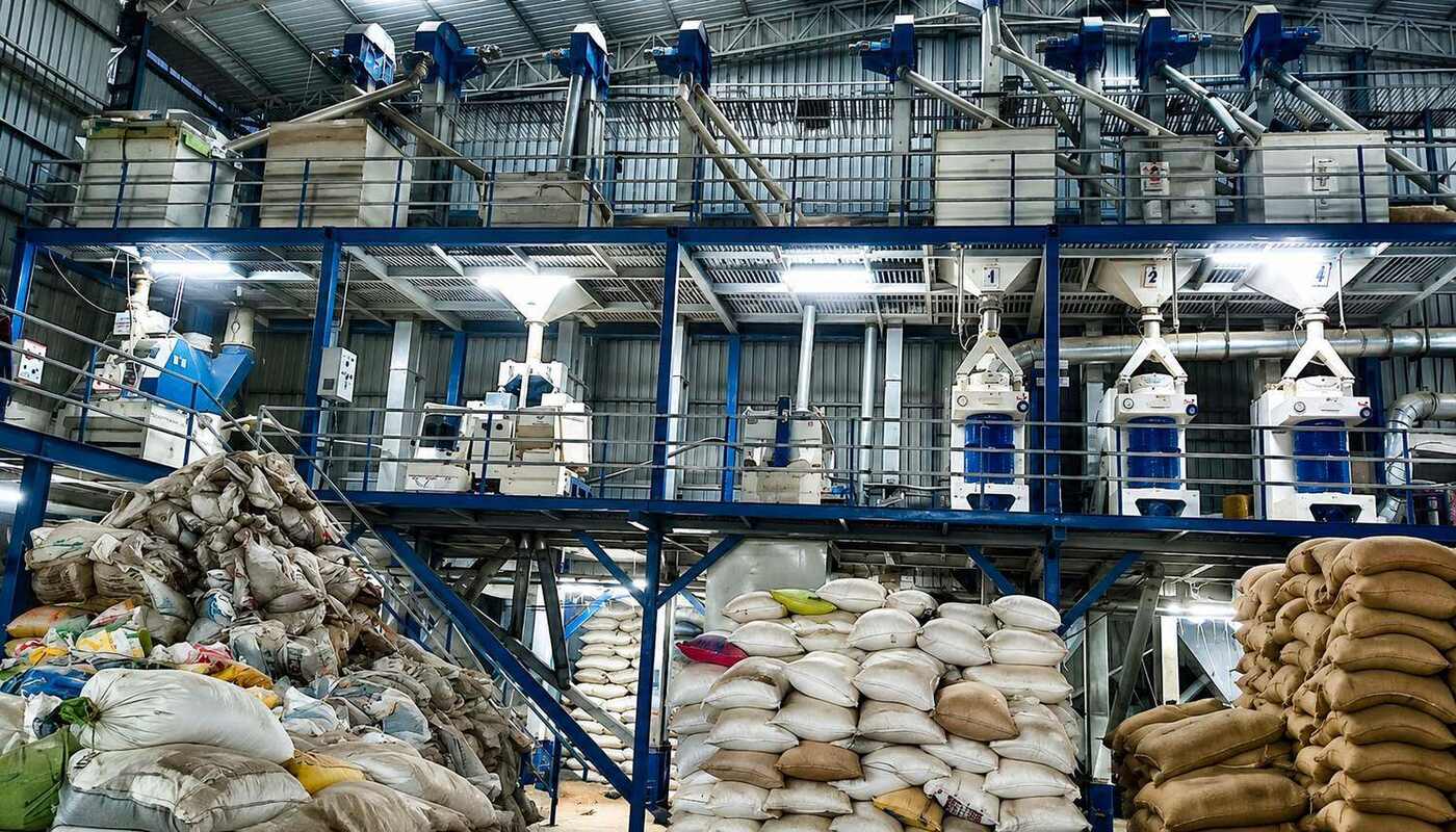 Branded rice packs on the sealing line