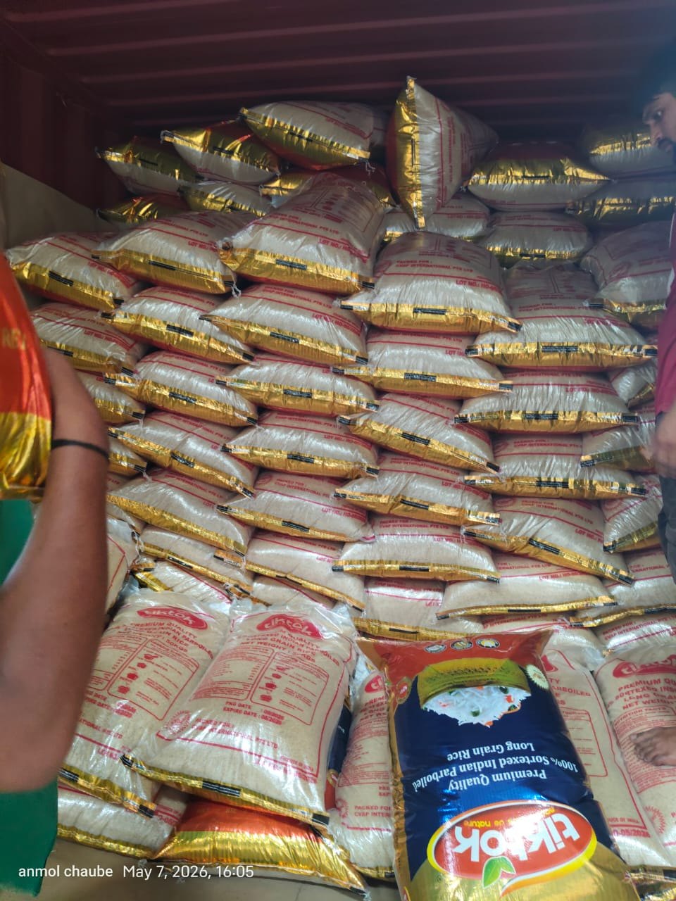 Retail bags being stuffed into an export container